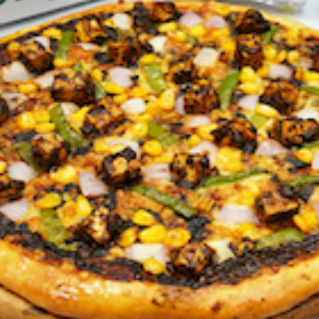 12" Jamaican Jerk Veg Pizza.