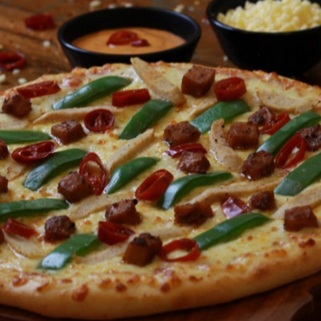 9" Korma Chicken Pizza.