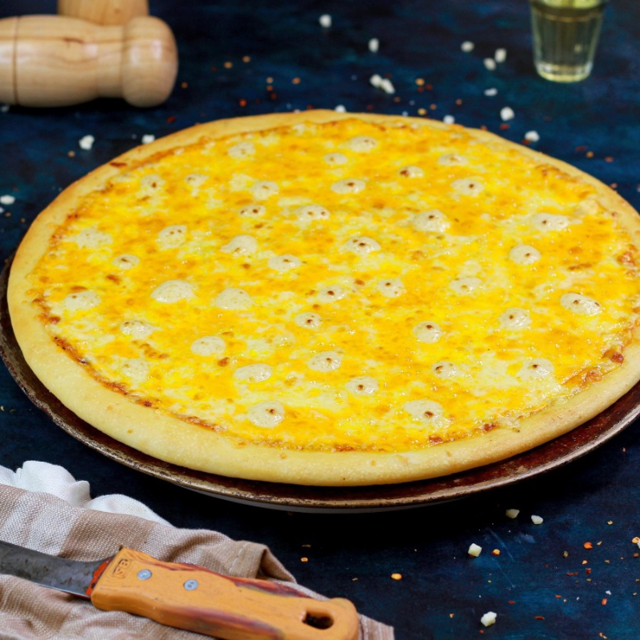 9" Cheezy 7 Pizza.